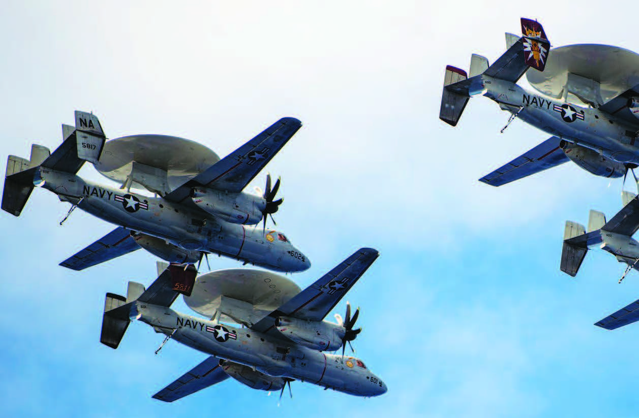 Four E-2C Hawkeyes from “Sun Kings” of Carrier
Airborne Early Warning Squadron 116 fly in formation near aircraft carrier USS Nimitz, Pacific Ocean, June 13, 2023 (U.S. Navy/Hannah Kantner)